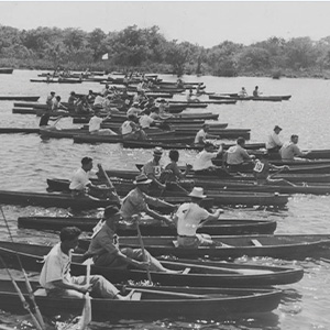 1934 Pirogue Race Gathers Crowd; 39-Year Old Grandpa Wins